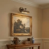 Loxby picture light bronze - lifestyle